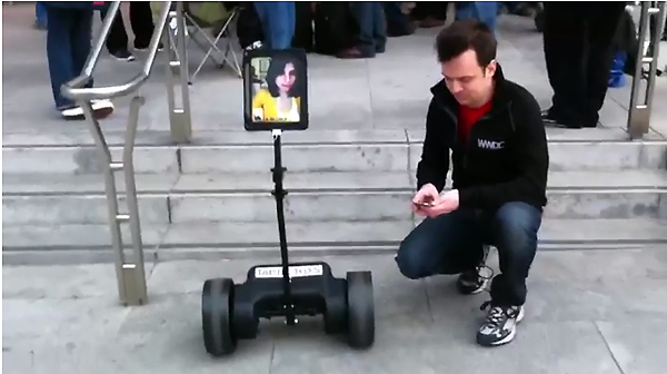iPad Telepresence Robot Waits in Line at |