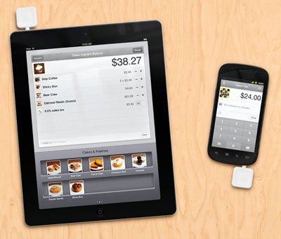 Square card readers plugged into iPad and phone